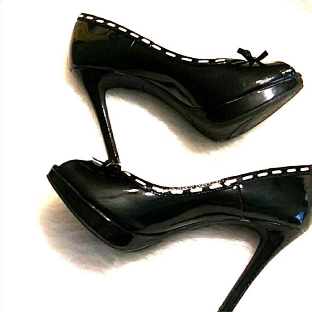 Glossy black peep toe heel